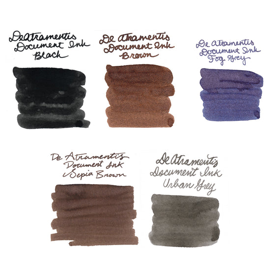 Five swatches of ink from De Atramentis Document Ink in Black, Brown, Fog Grey, Sepia Brown, and Urban Grey on a white background.