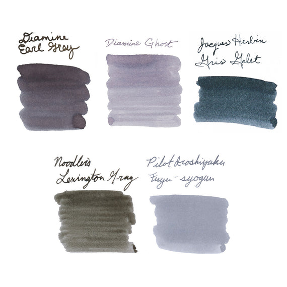 Collection of gray ink swatches from various brands on a white background
