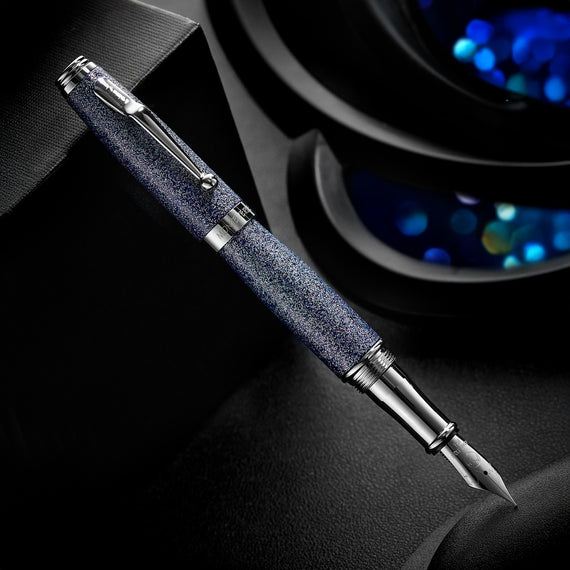 Fountain pen with textured grip and metallic accents on a dark background