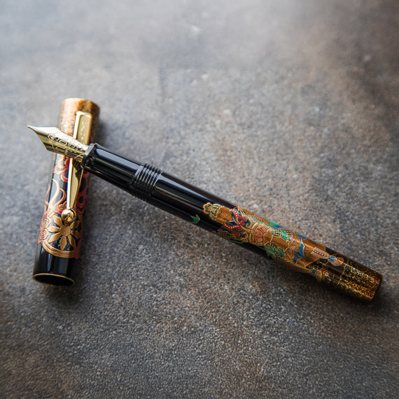 Decorative fountain pen on a textured surface