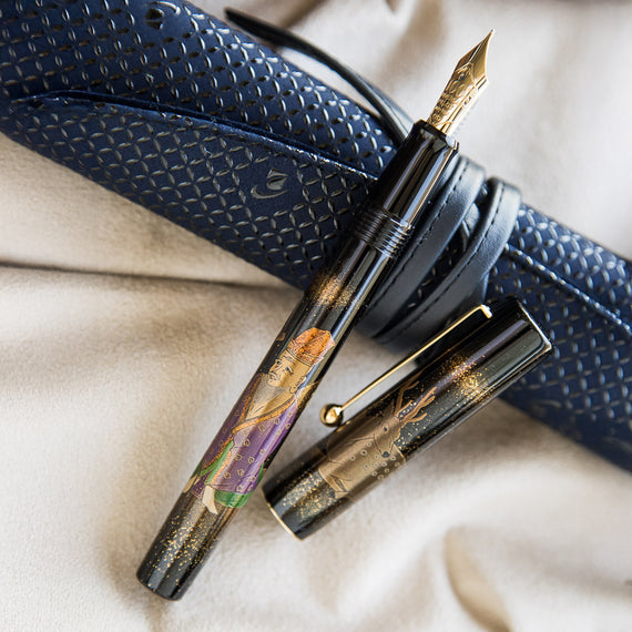 Fountain pen with decorative design on a textured surface