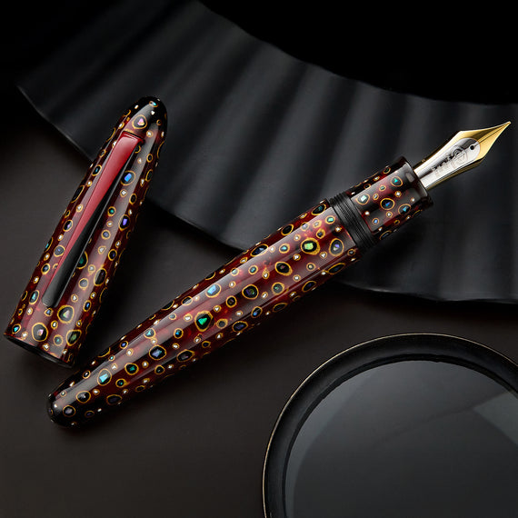 Decorative fountain pen on a dark background